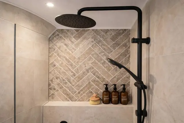 Walk-in shower with rainfall head